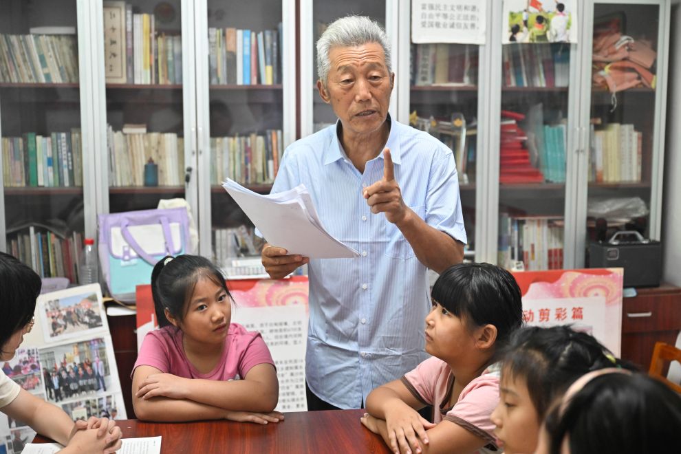图片故事｜21年坚imToken官网下载守，只为村里孩子们