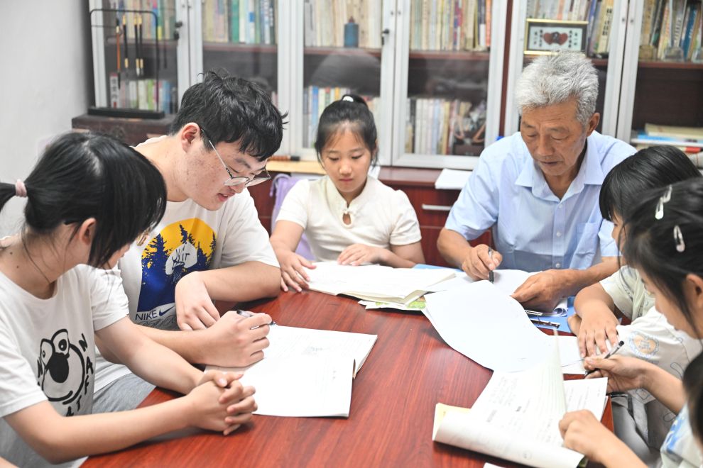 图片故事｜21年坚imToken官网下载守，只为村里孩子们